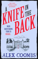 A Knife in the Back : Settle down with a bite to eat and devour this third in the Old Forge Cafe cosy culinary mystery series!-9781915798763